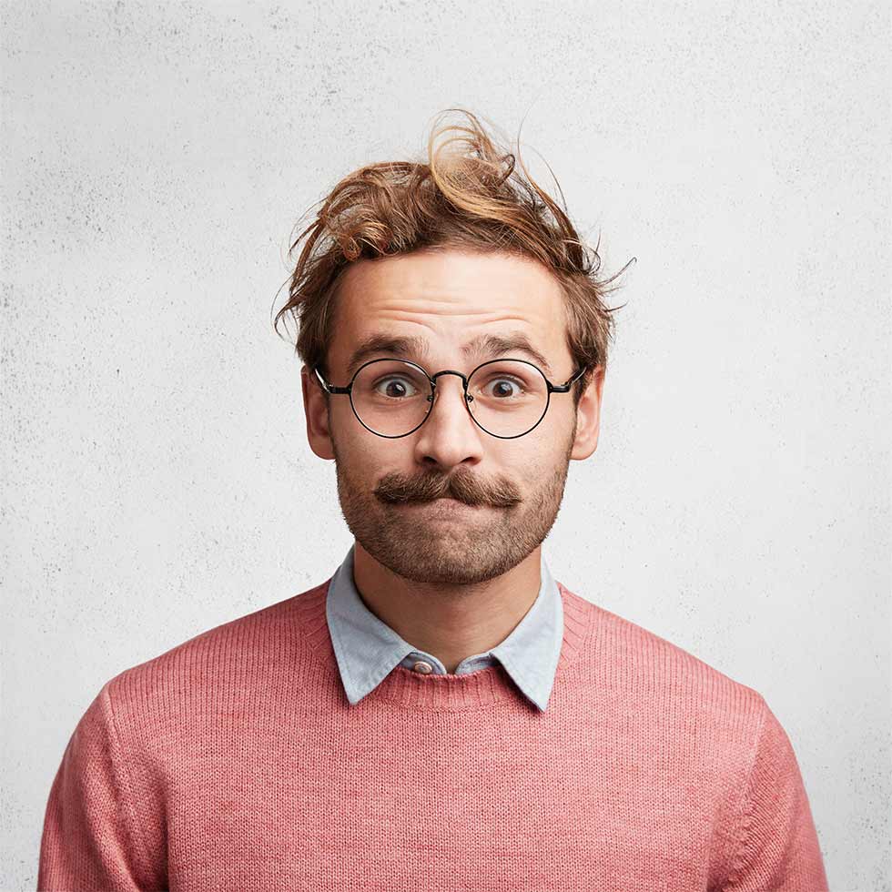 young-man-with-beard-round-glasses